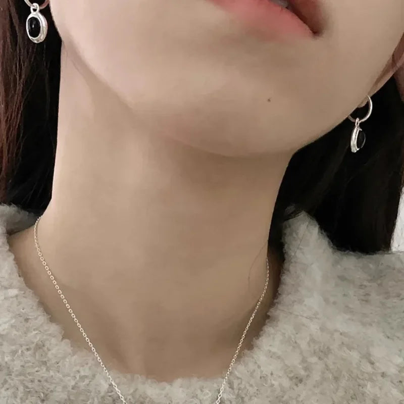 PONYKISS 925 Sterling Silver Black Elliptical Zircon Hoop Earrings for Women Light Luxury Fine Jewelry Minimalist Accessories